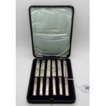 A cased set of six silver handled butter knives Condition Report: Available upon request