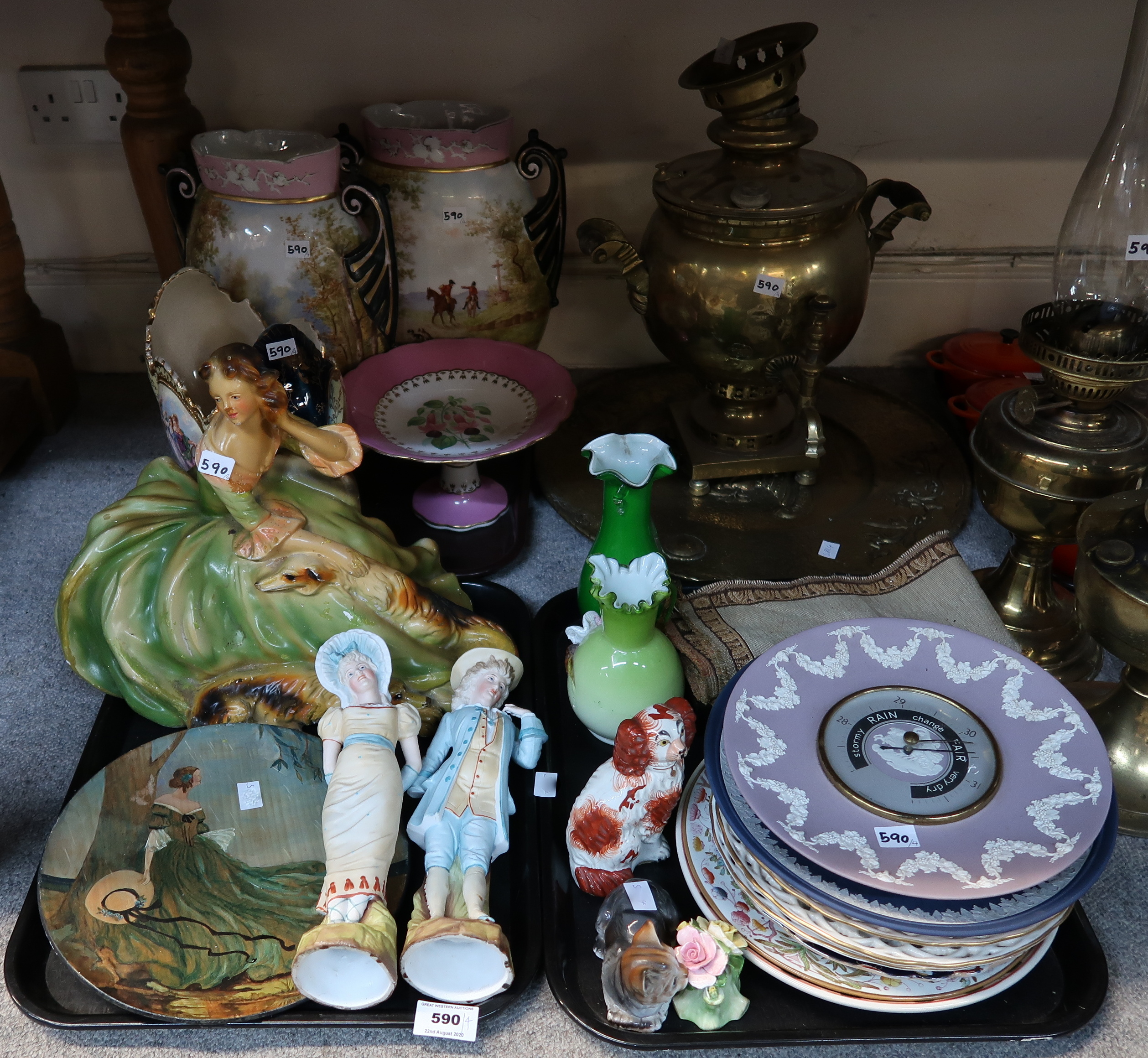 A large plaster figure of a woman, a pair of Victorian pottery vases, a pair of bisque figures and