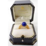 An 18ct gold Hamilton & Inches statement ring set with a ball of lapis lazuli, ball size 9mm, finger