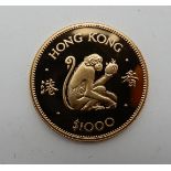 A cased gold Hong Kong 1000 dollar coin, 1980 Condition Report: