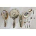 A lot comprising a three piece silver dressing table set, a silver dish set with a Hong Kong five