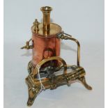 A copper and brass steam engine, 15cm high Condition Report: Available upon request