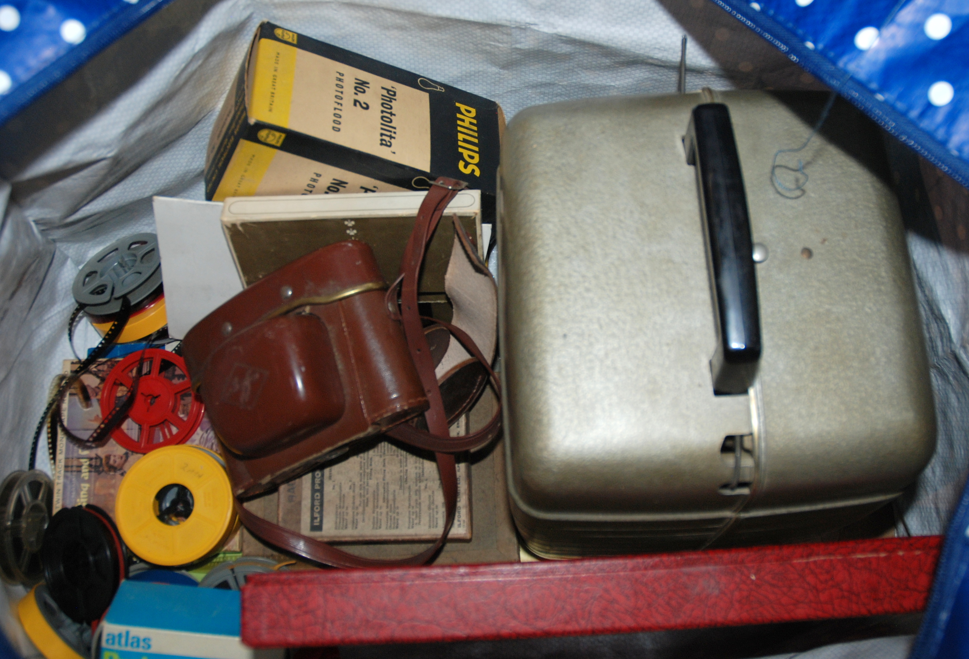 A vintage projector, screen and camera etc Condition Report: Available upon request