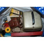 A vintage projector, screen and camera etc Condition Report: Available upon request