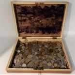 A quantity of UK and foreign coins mainly modern, in a cutlery case Condition Report: Available upon