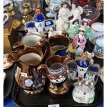 Assorted Staffordshire flat back pottery figures, houses, money boxes, copper lustre jugs etc