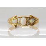 An 18ct gold opal and diamond ring, hallmarked Birmingham 1899, size N, weight 3.4gms Condition