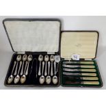 A lot comprising a cased set of twelve silver teaspoons with tongs, Sheffield 1918 and a cased set