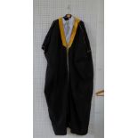 A Syrian Jubbeh, black with gold fabric trim, with white undershirt and student gown (3) Condition