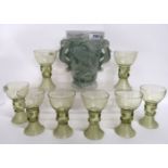 A set of eight green hock glasses and a Barolac green stained and opaque glass vase decorated with