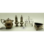 A silver toast rack, a pair of pepperettes, a mustard and a salt, various hallmarks 250gms Condition