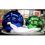 Large blue and green witches balls and a pottery platter Condition Report: Available upon request