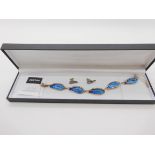 A silver and enamel Ortak bracelet and earring set Condition Report: No condition report available