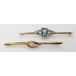 A 15ct gold opal set brooch, length 6.2cm, weight 3.2gms and a 9ct gold blue gem set brooch length