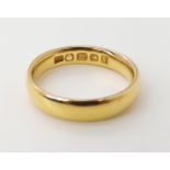 A 22ct gold wedding ring size J, weight 4.4gms Condition Report: Available upon request