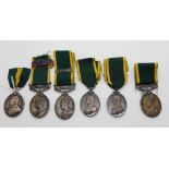 A lot comprising six territorial efficiency medals to 1004497 Dvr. J. Miller R.A.S.C., 329840 Pte.
