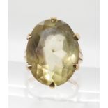 A 9ct gold smoky quartz ring, size J1/2 approx, weight 7.1gms Condition Report: Available upon