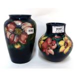 A Moorcroft anemone pattern vase and a Spring Flowers vase Condition Report: Available upon request