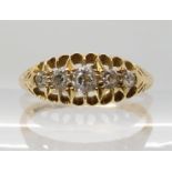 An 18ct gold five stone diamond ring set with estimated approx 0.25cts of old cut diamonds, finger
