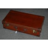 A large brown leather suitcase Condition Report: Available upon request