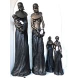 Four resin sculptures of African women Condition Report: Available upon request