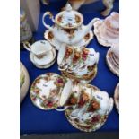 A Royal Albert Old Country Roses teaset comprising six cups, saucers, plates, teapot, cake plate,