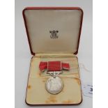 A cased British Empire medal to Miss Margaret MacKenzie Condition Report: Available upon request
