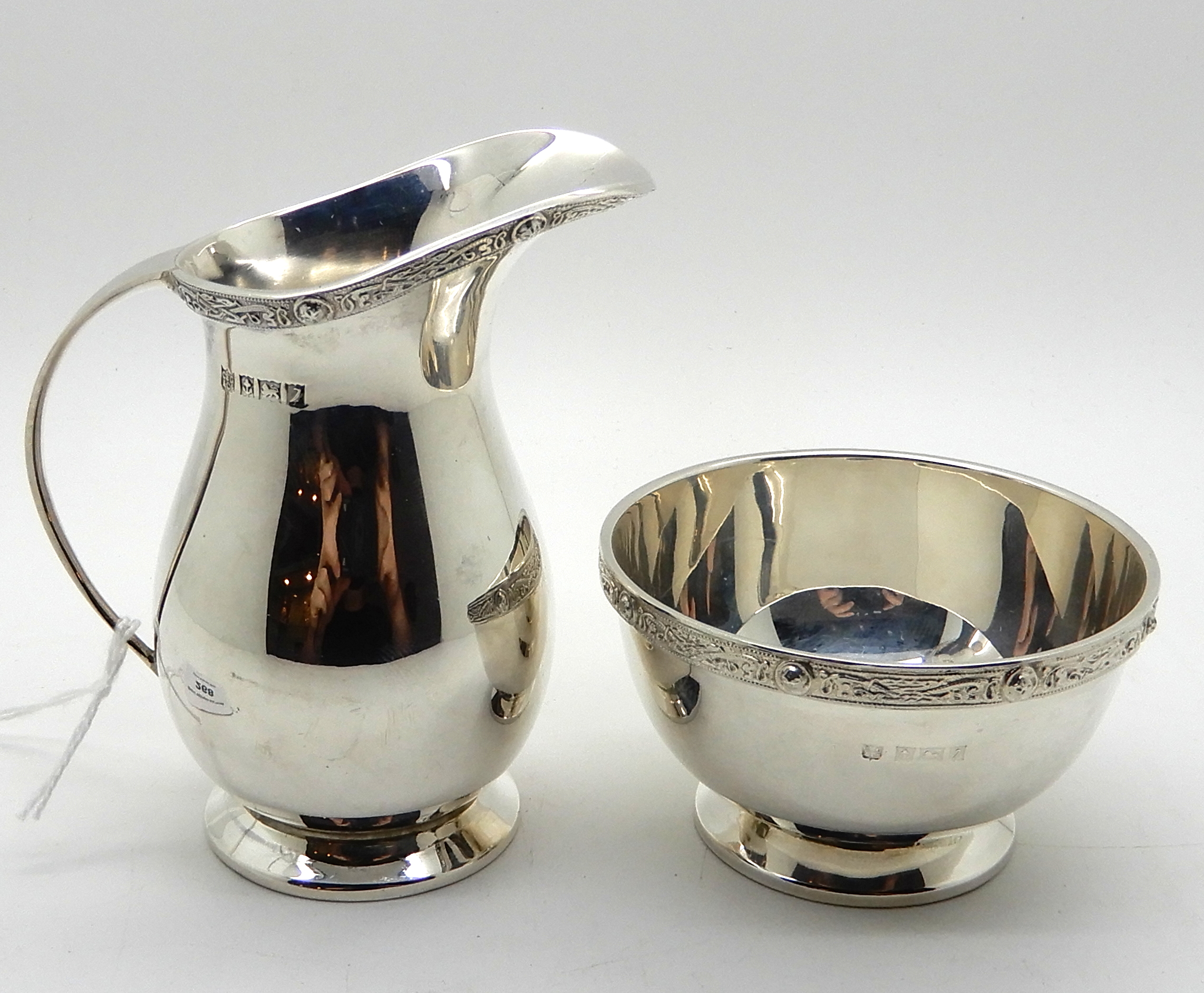 A silver cream and sugar, Birmingham 1958, cream jug 9cm high, 153gms Condition Report: Available - Image 3 of 3