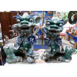 A large pair of pottery Chinese fo dogs Condition Report: Available upon request