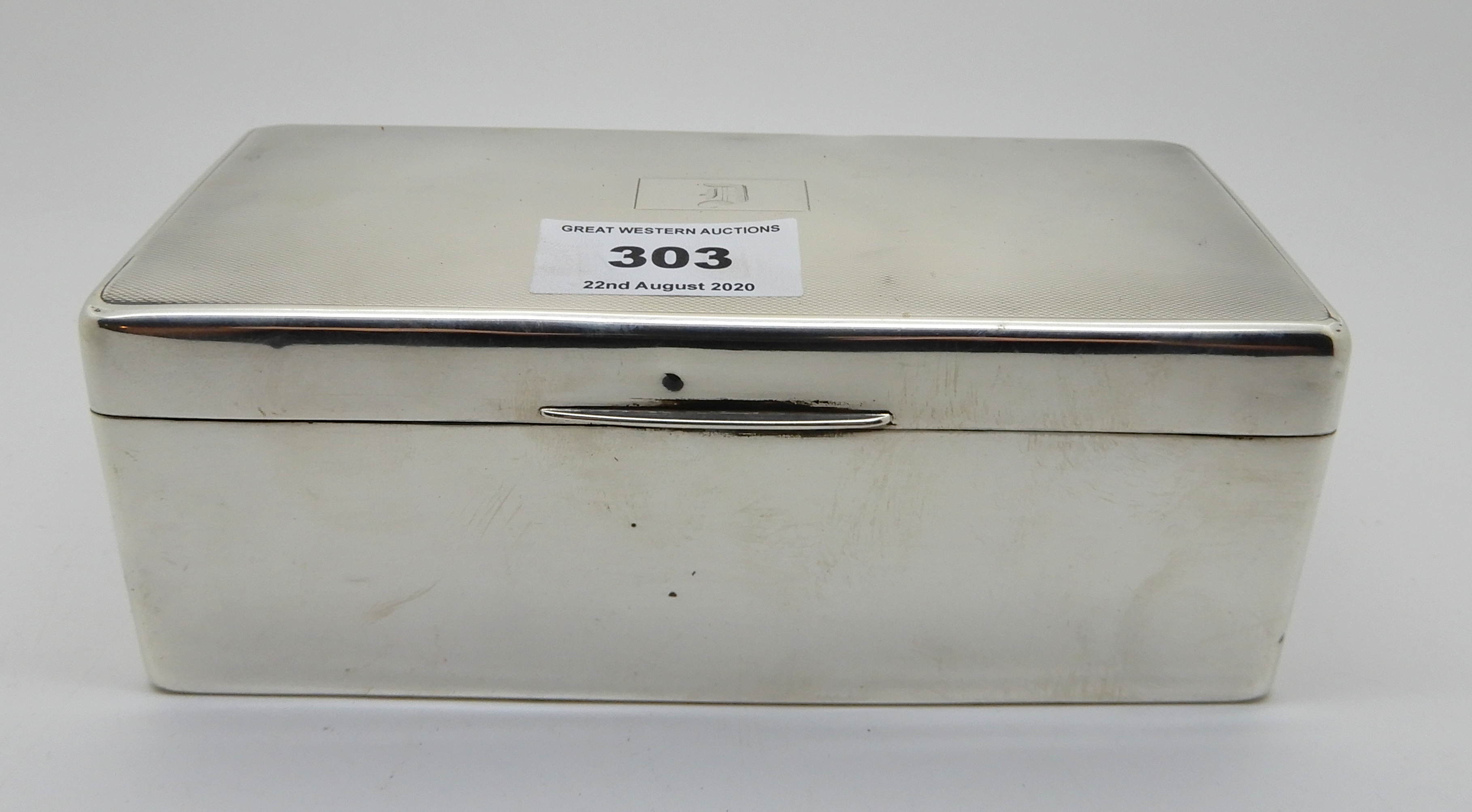 A lot comprising a silver cigarette box, a silver topped sugar castor, silver sugar tongs, silver - Image 4 of 6