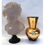 An Italian blue glass vase with applied flower decoration and a frosted resin bust of a maiden