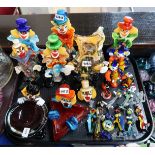 A collection of colourful Murano glass clowns Condition Report: Available upon request