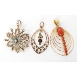 An Edwardian flower pendant brooch set with seed pearls and turquoise, dimensions 2.8cm x 3.8cm, a