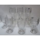 A set of six moulded glasses and another glass Condition Report: Available upon request