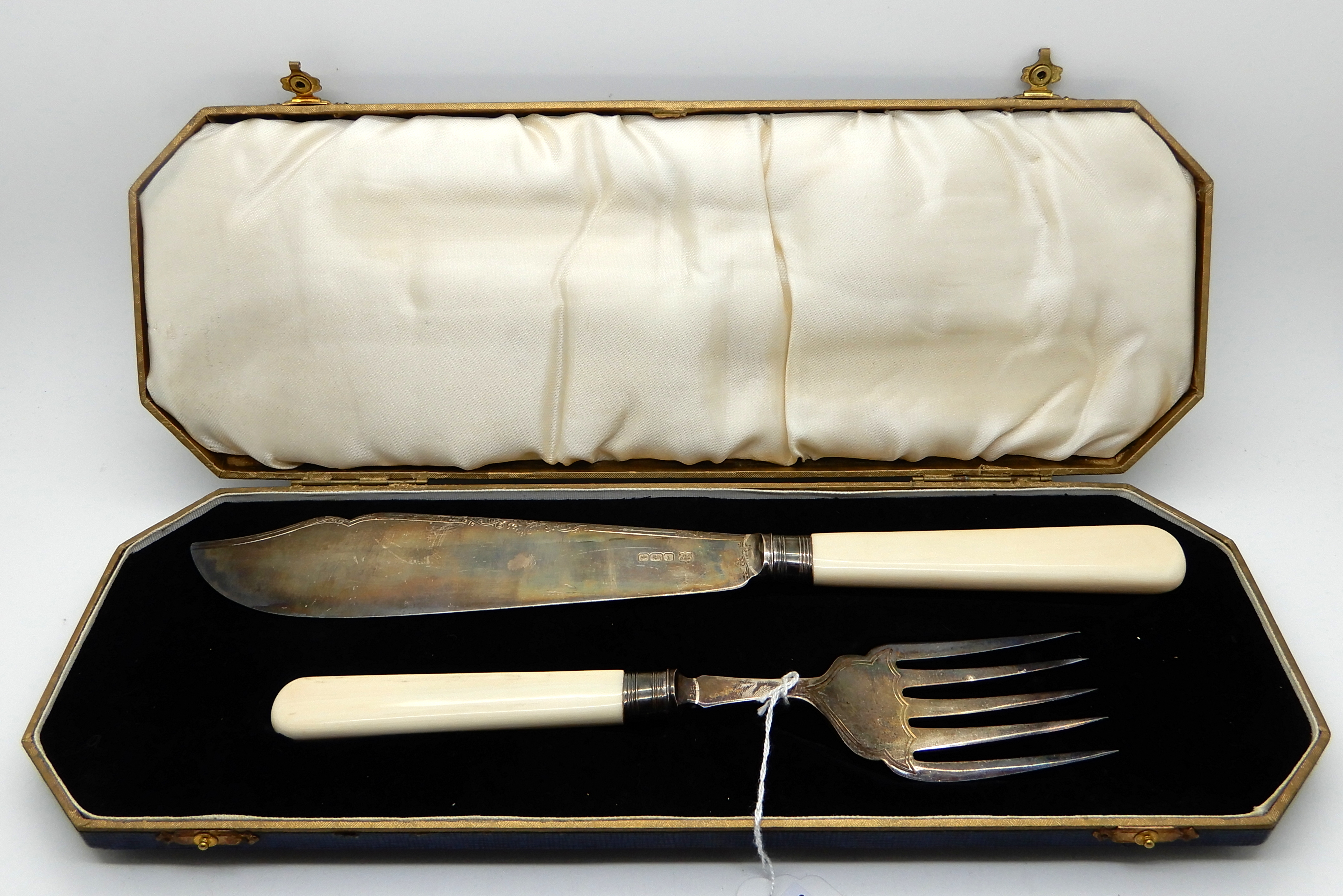 A cased pair of silver and bone handled fish servers, Sheffield 1926 Condition Report: Available