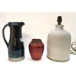 A Toff Milway glazed jug, a studio pottery lamp base and a glass vase Condition Report: Available