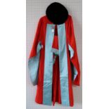 Exeter University cape, hood and velvet bonnet Condition Report: No condition report available for