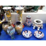 A pair of Satsuma vases, four other vases, a stand and two Imari dishes Condition Report: