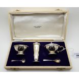 A cased three piece silver condiment set with Celtic decoration, Birmingham 1967 Condition Report: