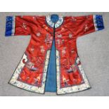 A Chinese silk house coat with embroidered decoration Condition Report: Available upon request