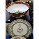 A Minton plate with turquoise and floral painted border with central monogram/motif and a Royal