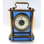 A blue glass and brass carriage clock Condition Report: Available upon request