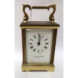 A Mappin and Webb brass and glass carriage clock Condition Report: Available upon request
