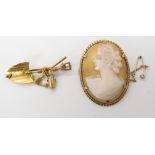 A 9ct gold South Africa miners brooch weight 3.5gms, together with a 9ct shell cameo brooch weight