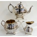 A three piece silver plated tea service Condition Report: Available upon request