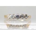 An 18ct gold five stone diamond ring, set with estimated approx 0.25cts of brilliant cut diamonds.