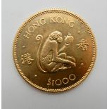 A cased gold Hong Kong 1000 dollar coin, 1980 Condition Report: Available upon request
