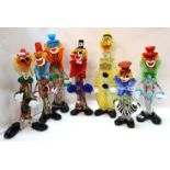 Six large colourful glass clowns and a decanter example Condition Report: Available upon request