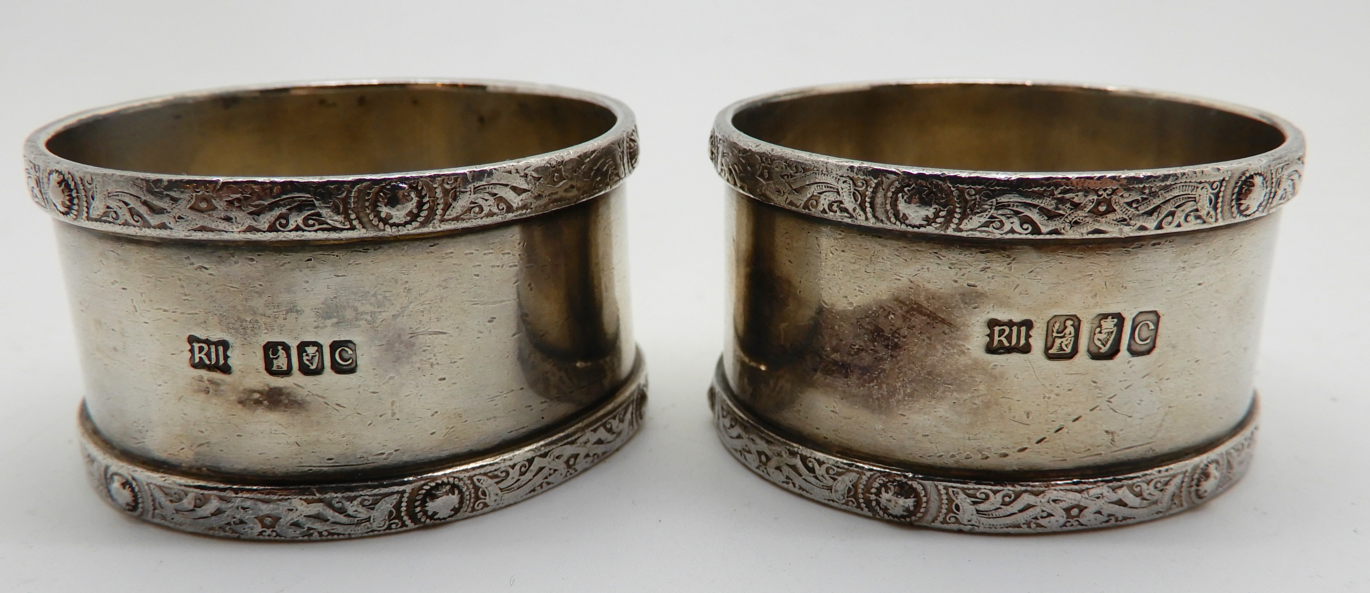 A lot comprising a pair of silver tablespoons, London 1804, a pair of silver napkin rings, a - Image 3 of 5