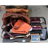 A collection of ladies handbags and purses including leather examples Condition Report: No condition